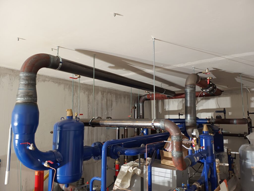 Completed installation of a district heating distribution center.